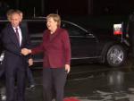   Путин и Меркель при встрече трижды пожали друг другу руки 